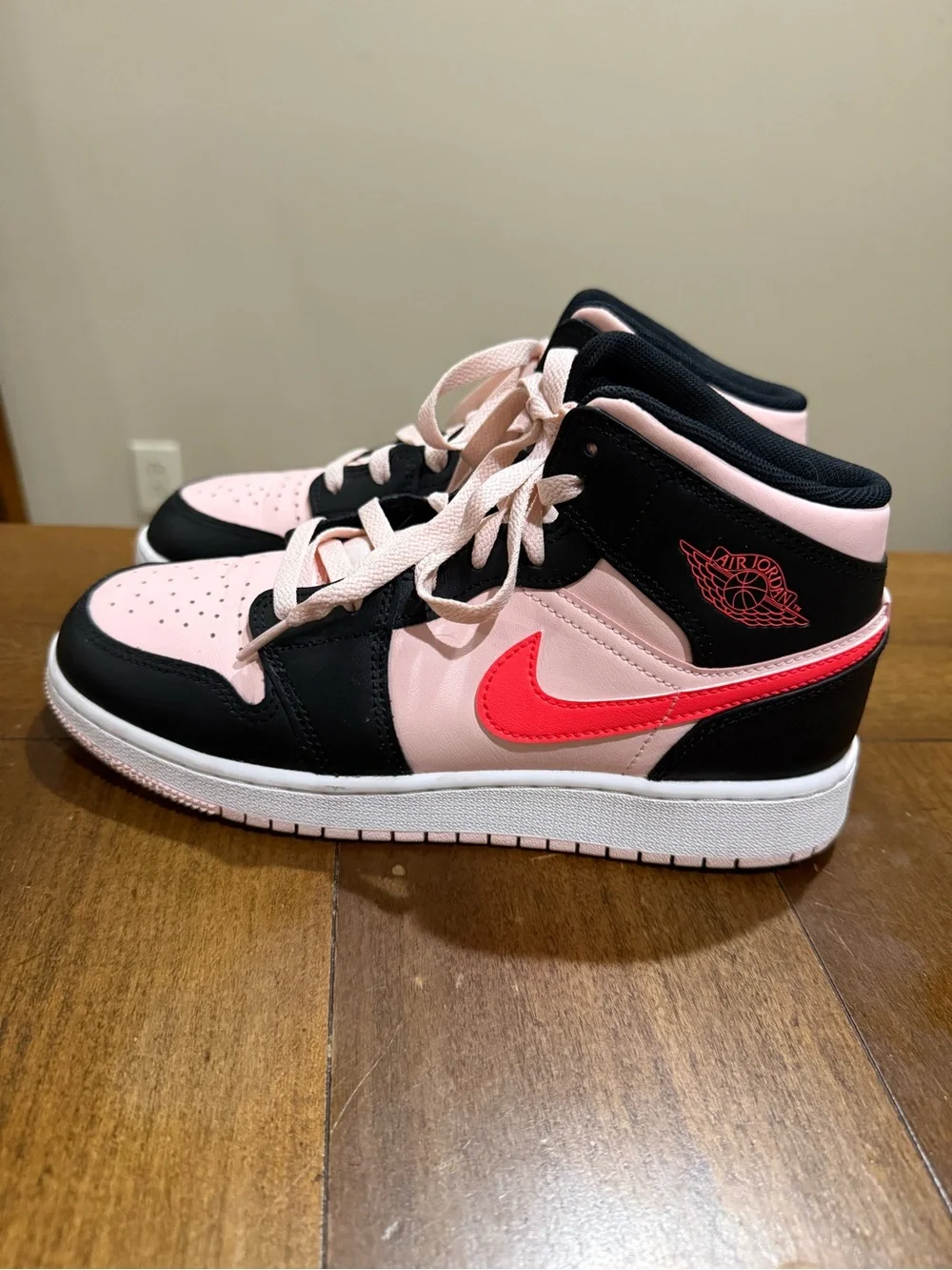 Nike Air Jordan Pink and Black High-Top Sneakers with Red Swoosh